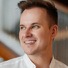 Gregory Shevchenko headshot in the site navigation